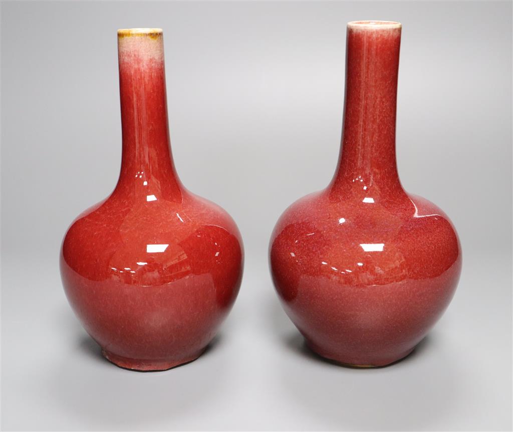 A pair of Chinese sang-de-boeuf vases, height 19cm